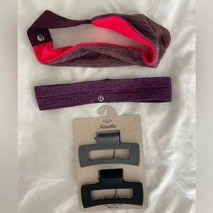 Two lululemon headbands in excellent condition. And two hairclips